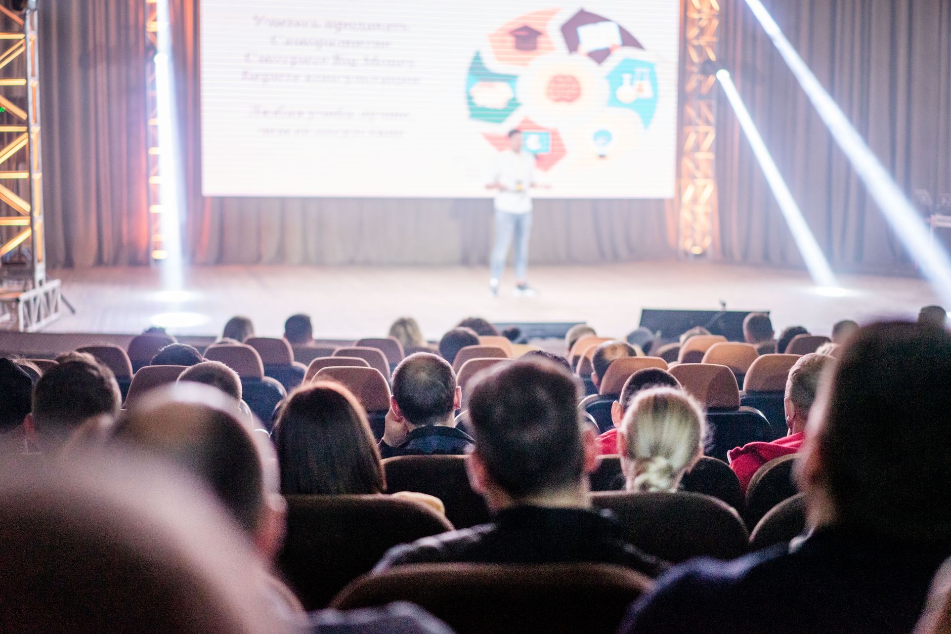 people sitting inside the auditorium